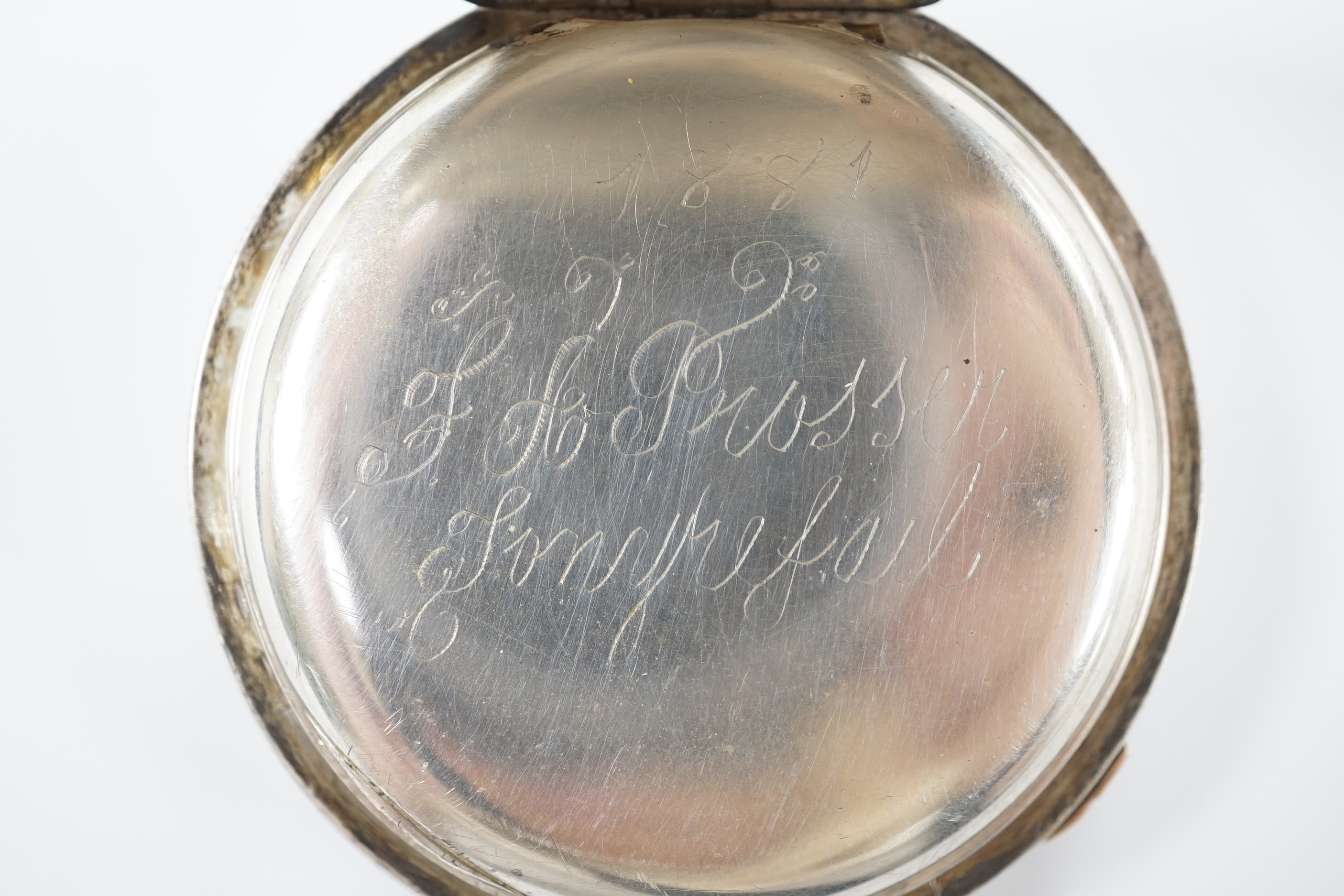 A Swiss white metal cased open faced chronograph pocket watch, by M. Ruff, Porth, with Roman dial.